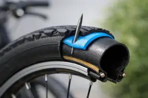 Wat doet een anti-lek laag in een fietsband?